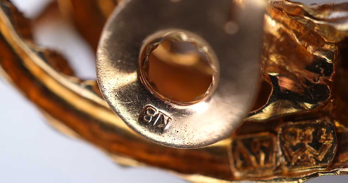 A pair of gold ear clips, Greece